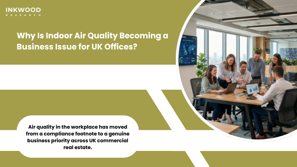UK office workers in commercial building with indoor air quality monitoring sensors showing employee wellbeing and healthy workplace IoT environmental sensor deployment